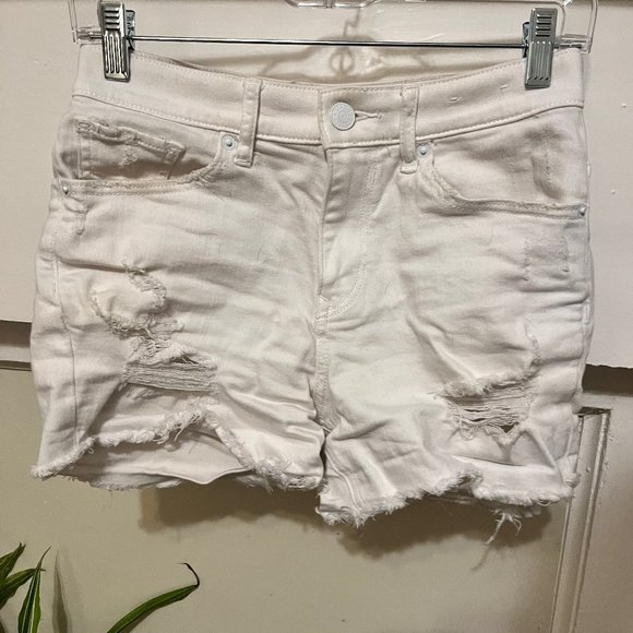 Express Distressed High Waisted Raw Hem Cutoff Denim Shorts in White - Picture 1 of 3